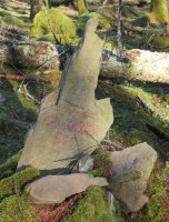 Harri pila tontorrean, Deskarga